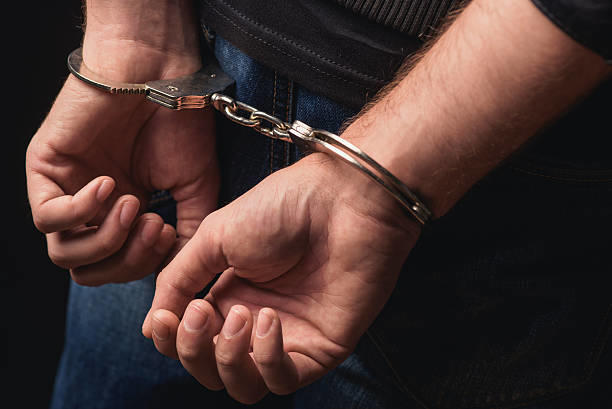 Handcuffed stock image